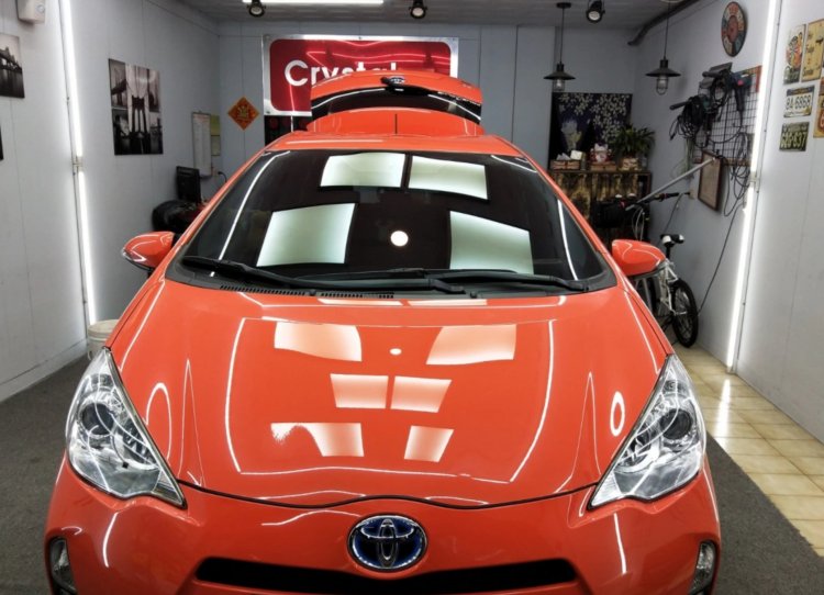 Toyota Prius C 2013，摩登橘